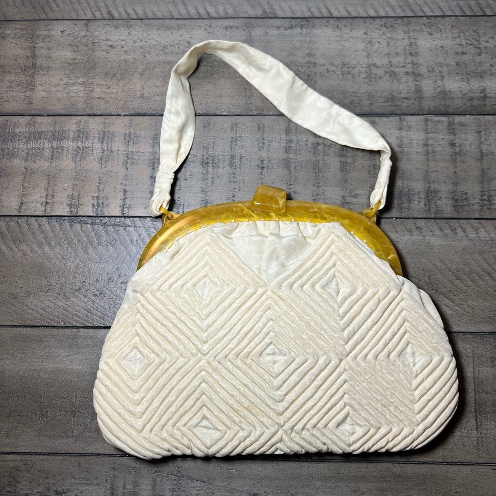Vintage cream colored quilted handbag